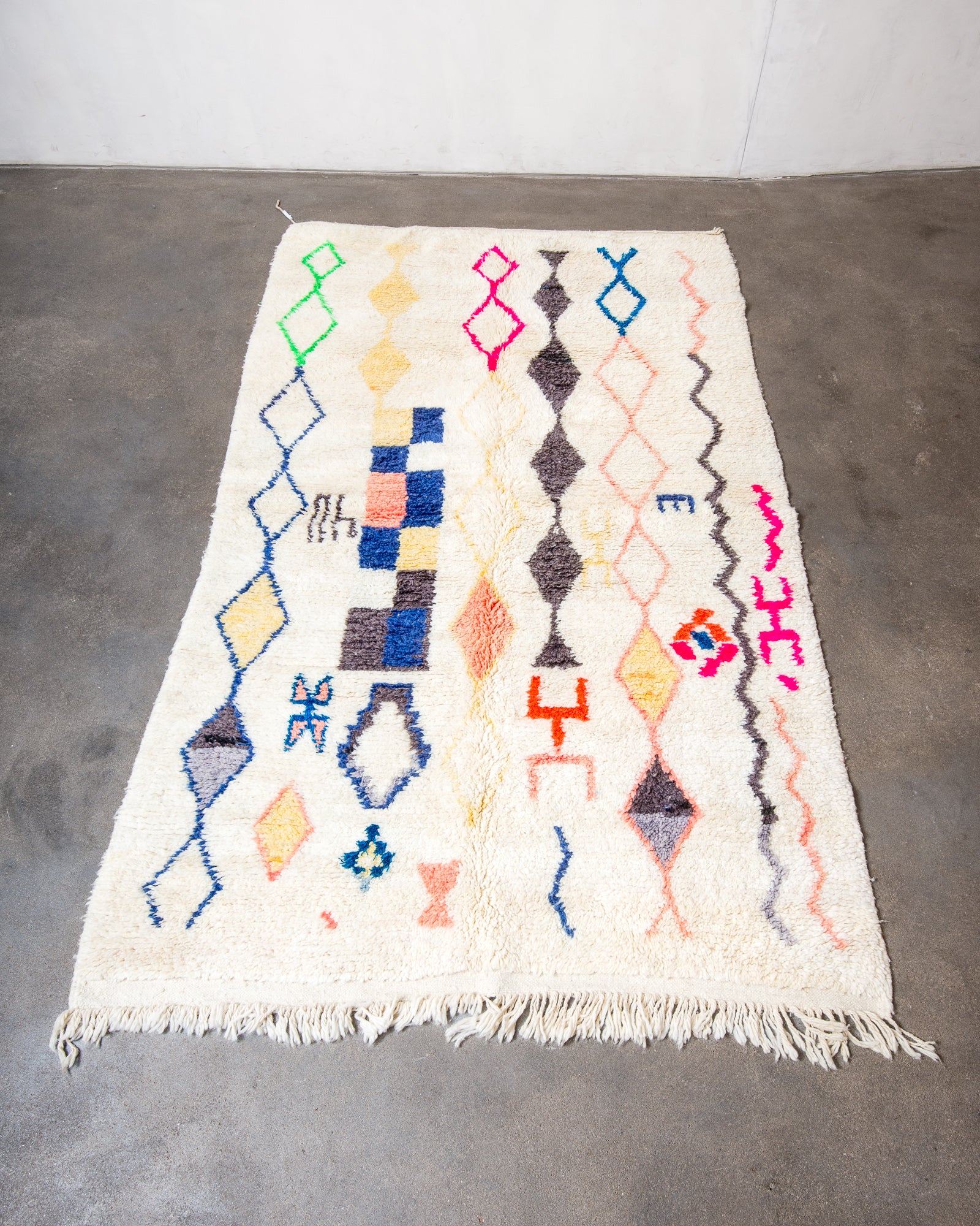 Modern, designer, handcrafted Berber rug from Morocco. Vintage carpet with beautiful colours and patterns and fluffy texture.